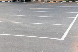 outdoor empty car parking near the park showing Maitland Parking Lot Striping